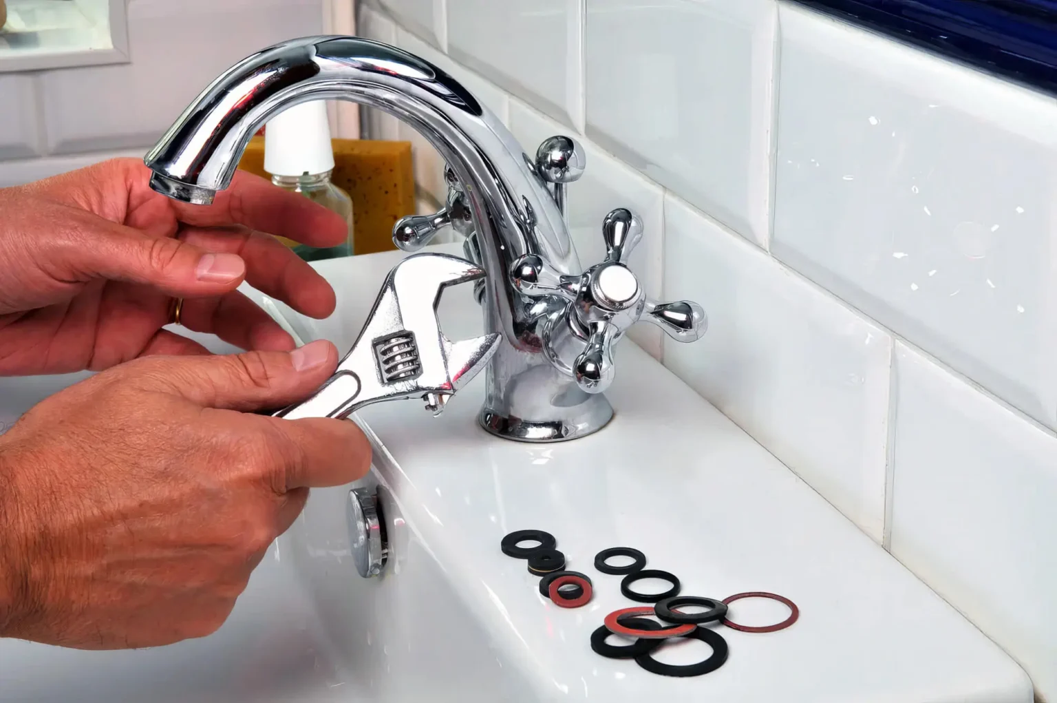 Plumber maintaining a bathroom faucet in El Dorado Hills